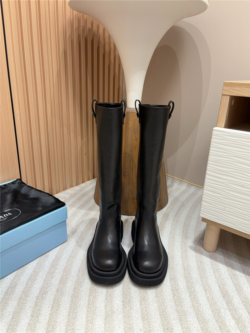 Pra*a women logo plaque leather boots in black