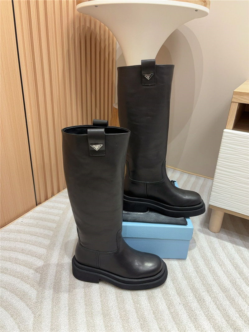 Pra*a women logo plaque leather boots in black
