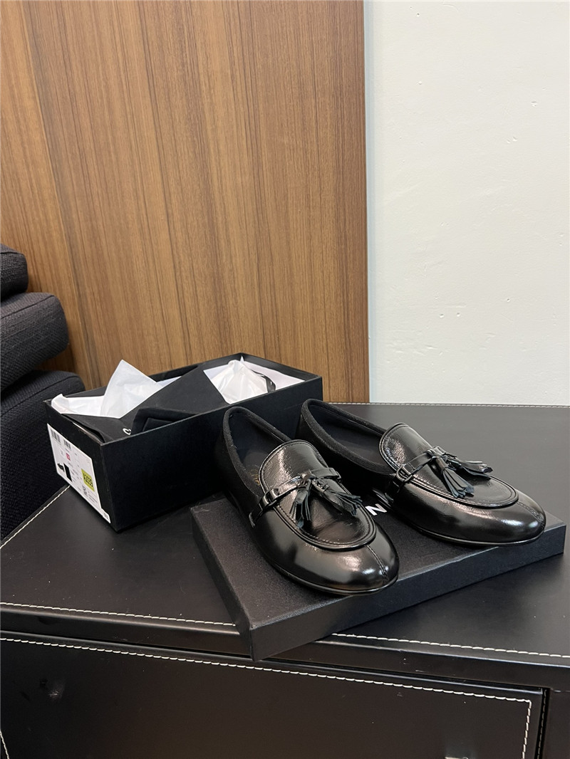 Ch**el tassel moccasin loafers in black smooth leather