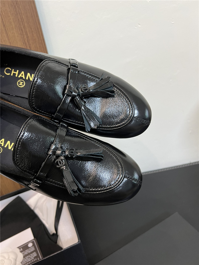 Ch**el tassel moccasin loafers in black smooth leather