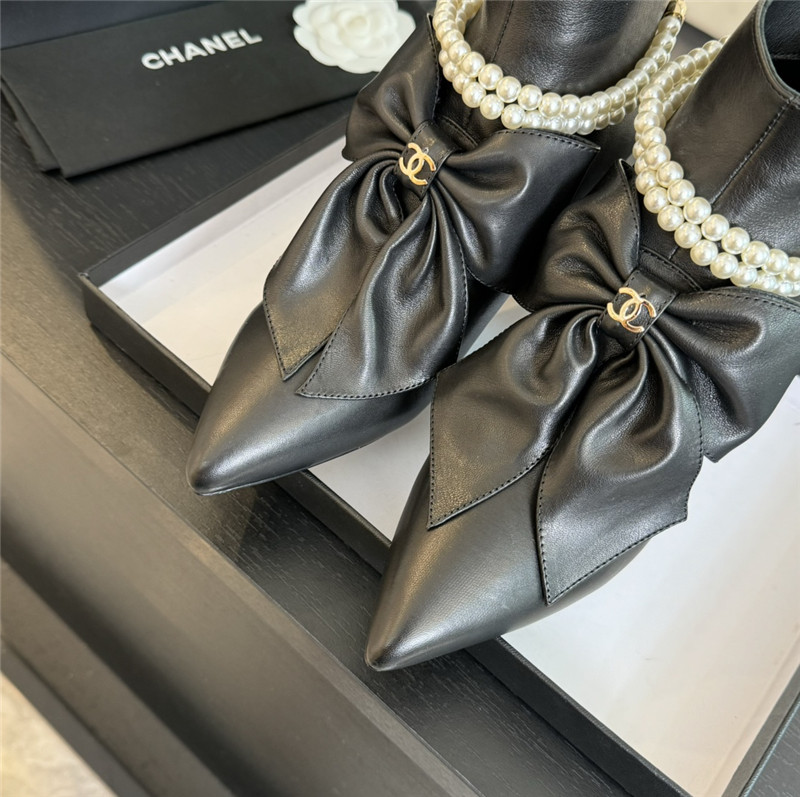 Ch**el black pointed toe pearl bow ankle boots