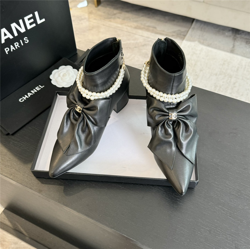 Ch**el black pointed toe pearl bow ankle boots