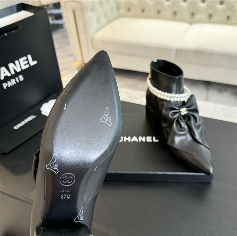 Ch**el black pointed toe pearl bow ankle boots