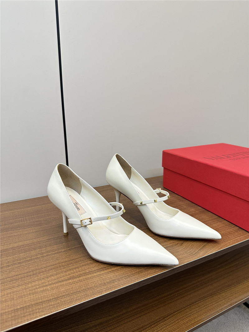 Va1e*ntin0 rockstud white leather pumps