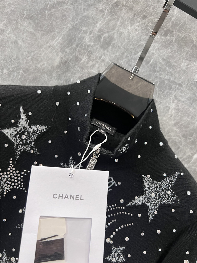 Ch**el half-zip star ski knit pullover in black