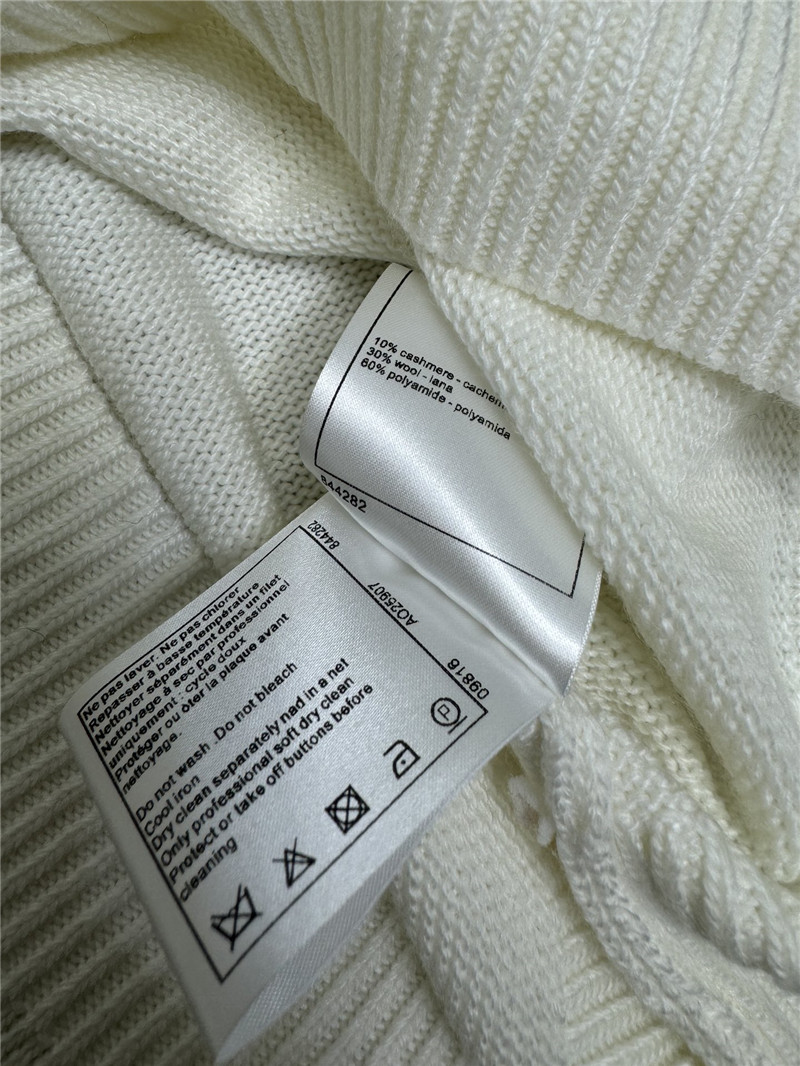 Ch**el white v-neck knitted sweater