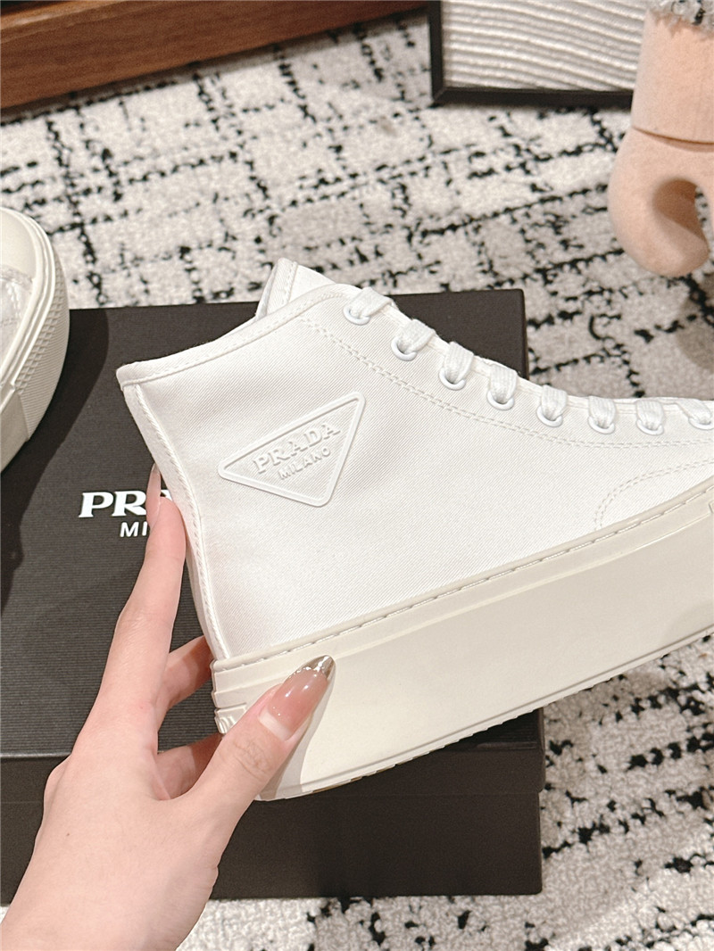 Pra*a white high-top canvas sneakers