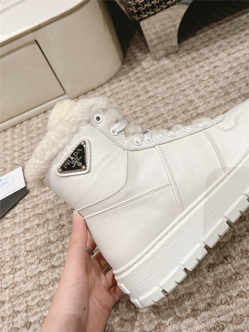 Pra*a white high top winter platform sneakers