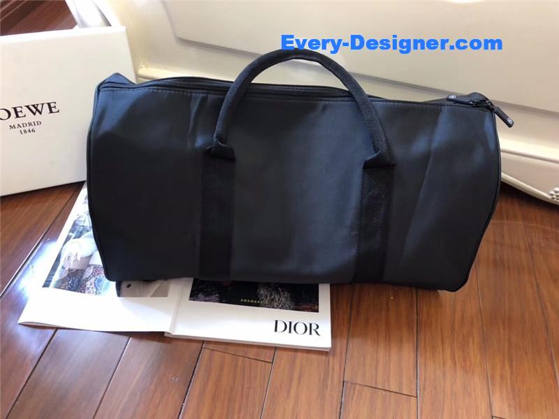 Ch**el logo luggage bag