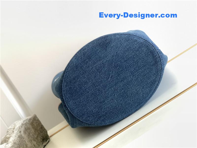 Ce1i*e blue denim canvas couffin bag