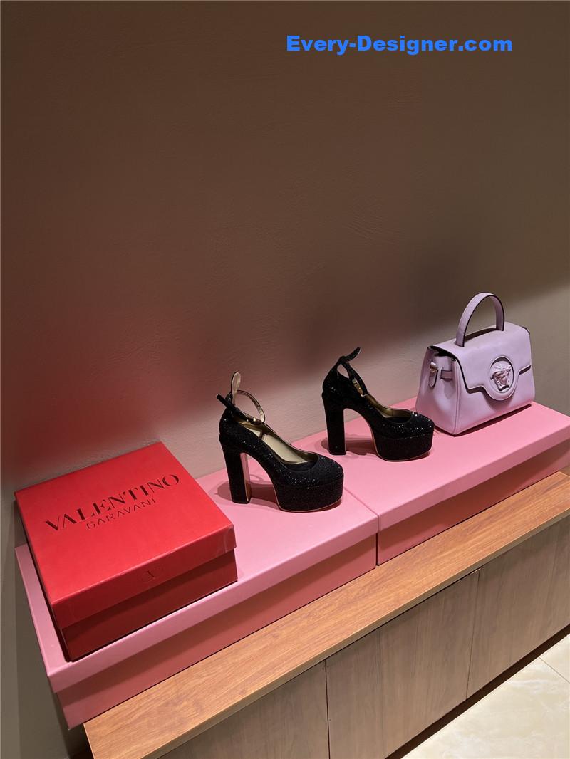 Va1e*ntin0 sky high platform pumps in patent leather