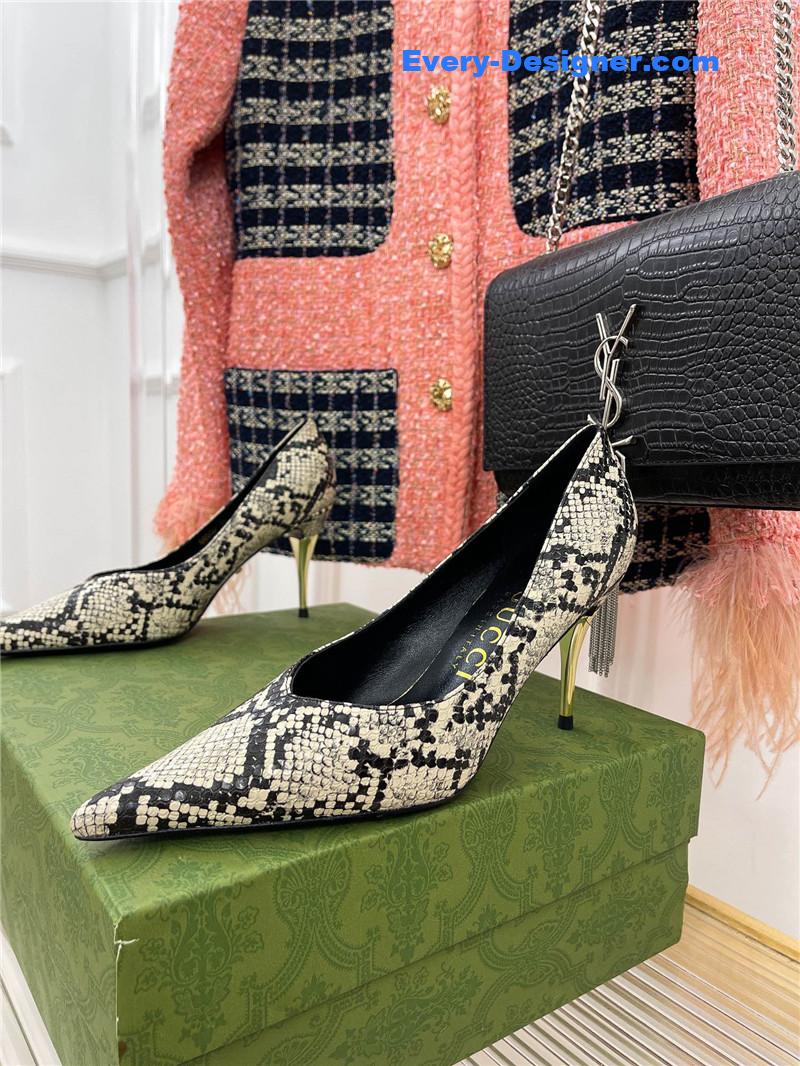 Gvc*1 metal heel pointed high heels