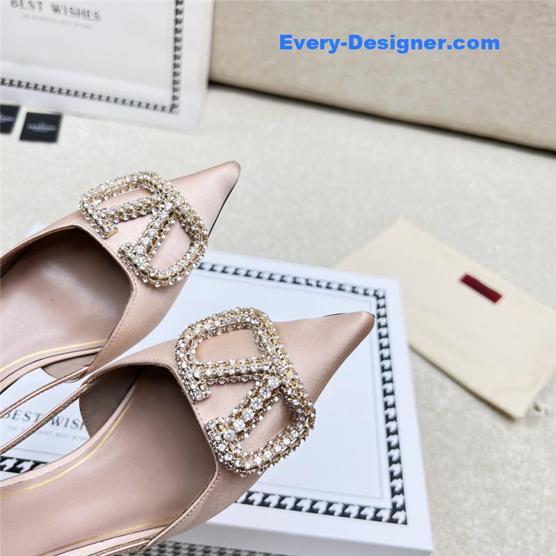 Va1e*ntin0 leather buckle pumps
