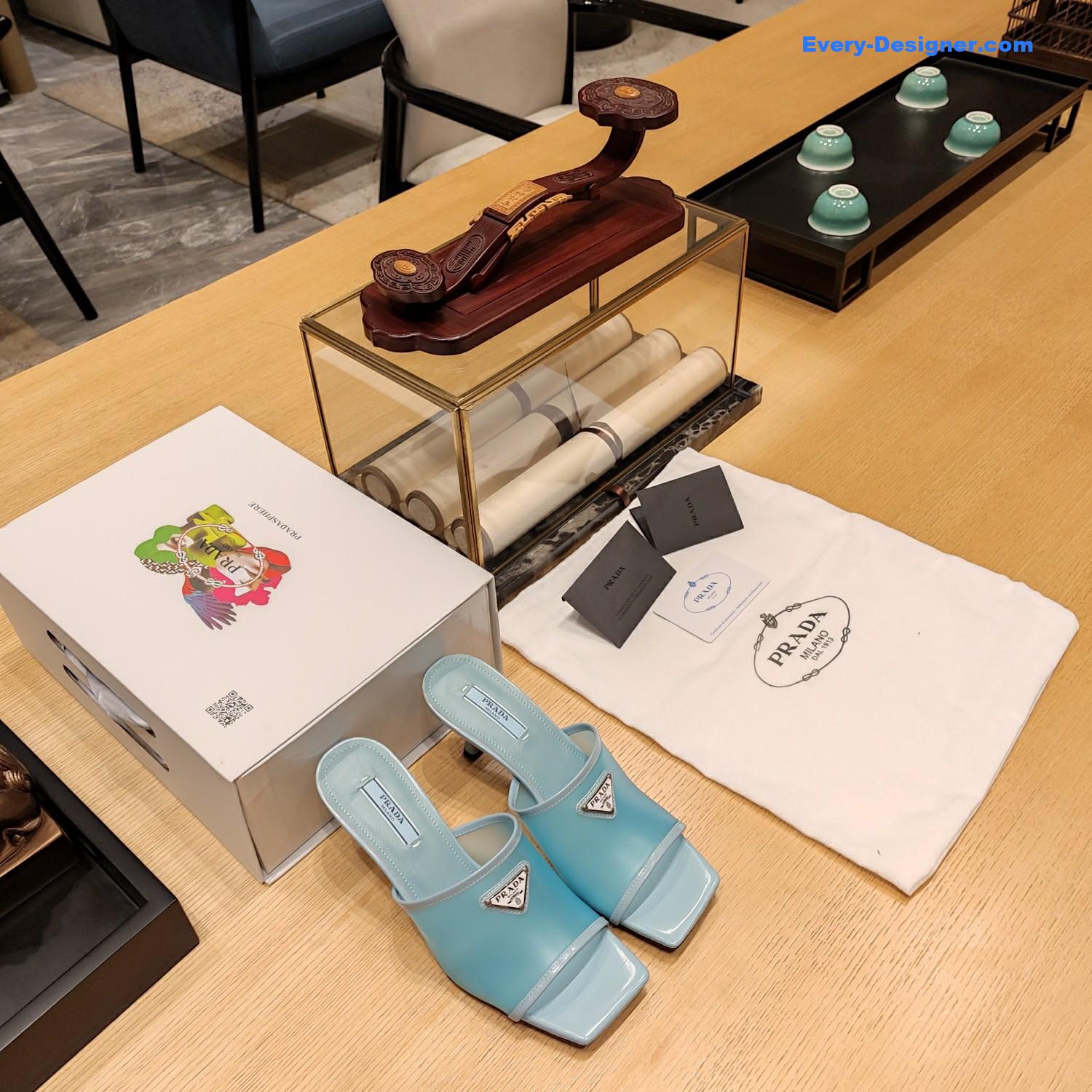 Pra*a metal logo triangle head square sandals