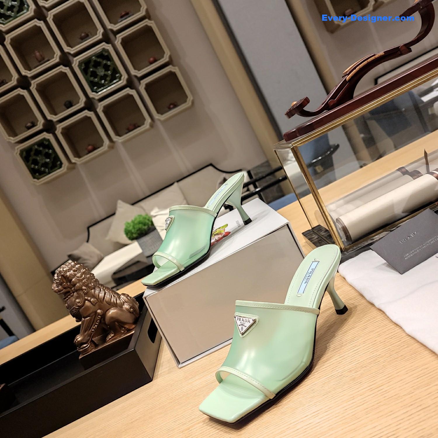 Pra*a metal logo triangle head square sandals