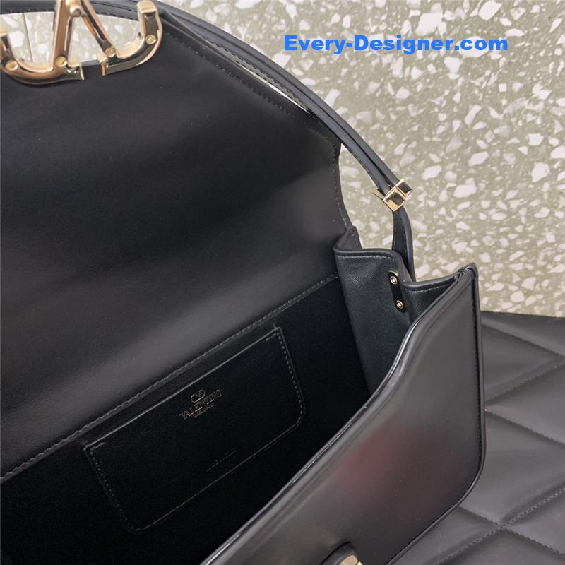 Va1e*ntin0 garavani letter leather shoulder bag