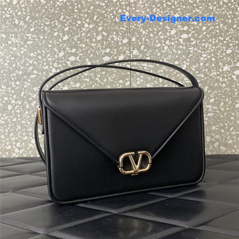 Va1e*ntin0 garavani letter leather shoulder bag