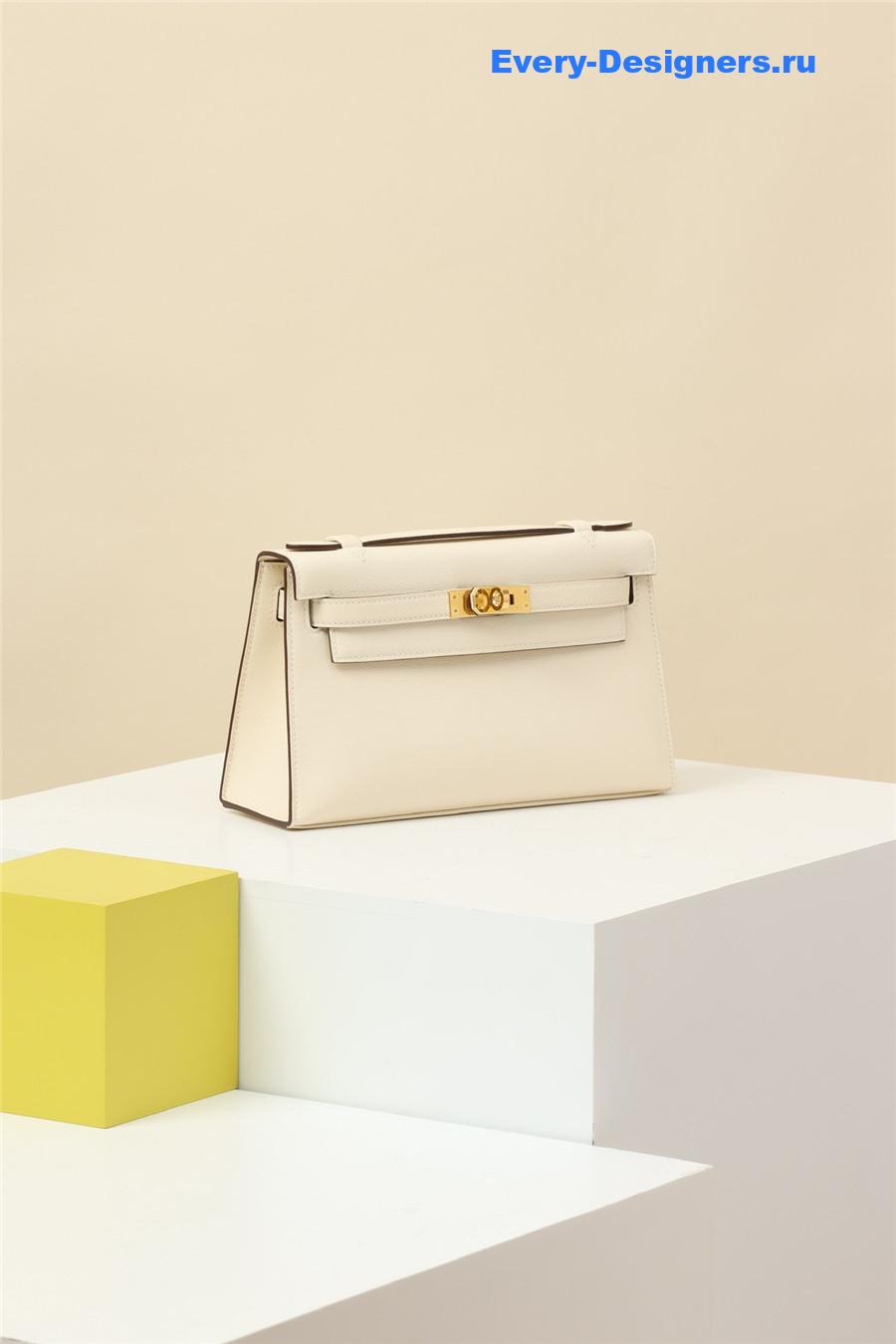 H**me5 kelly pochette swift leather bag beige