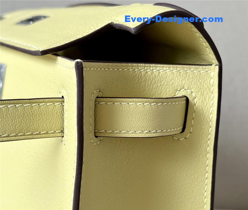 H**me5 kelly pochette swift leather bag