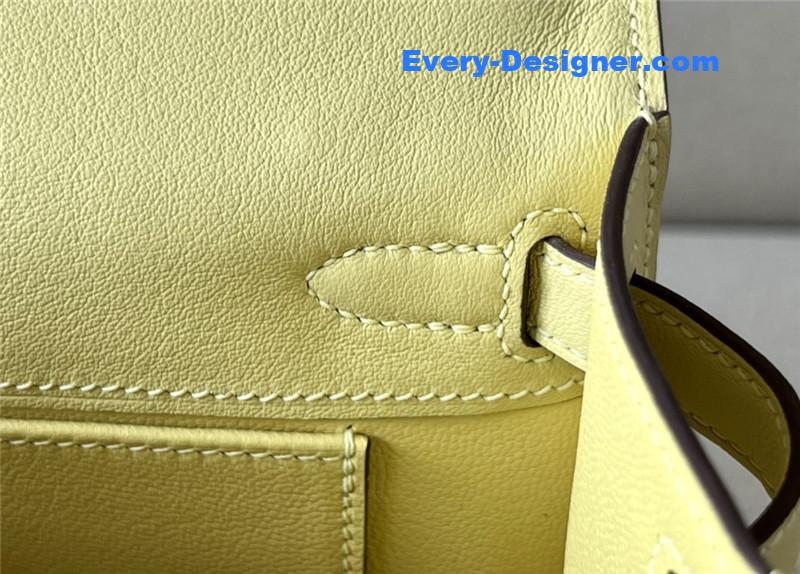 H**me5 kelly pochette swift leather bag