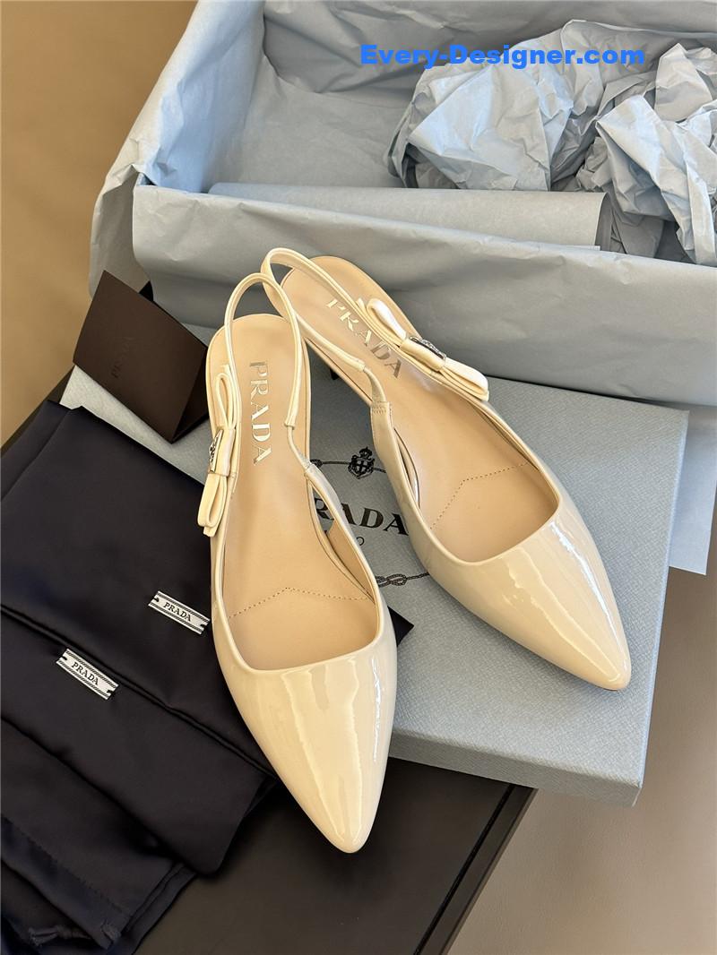Pra*a paneled satin bow pumps
