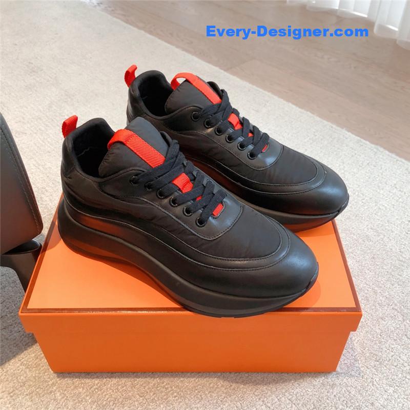 H**me5 black orange bouncing sneakers