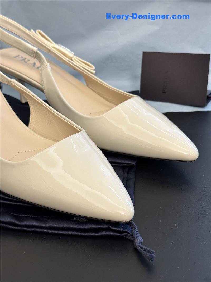 Pra*a paneled satin bow pumps