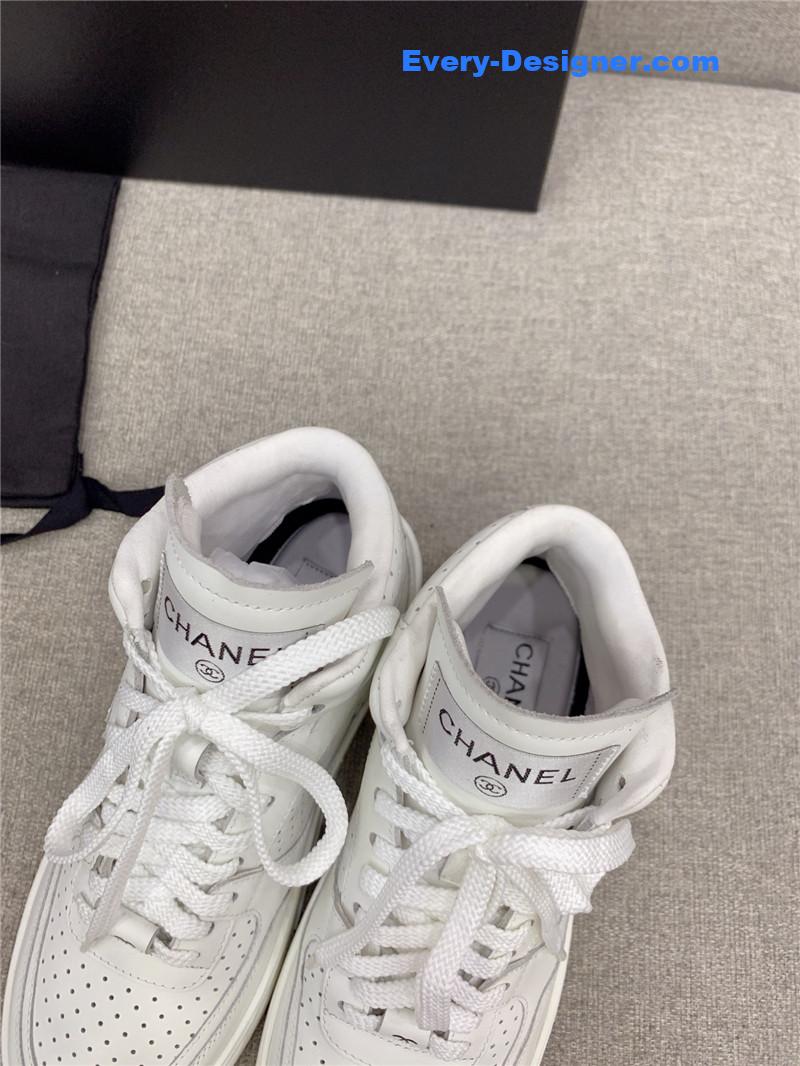 Ch**el white high-top sneakers