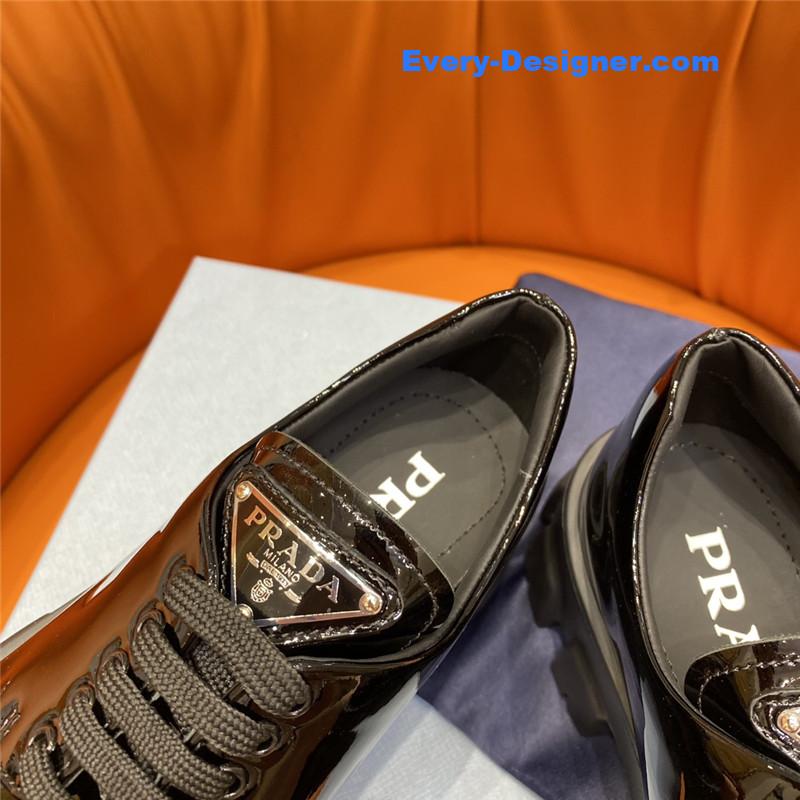 Pra*a triangle logo lace-up loafers