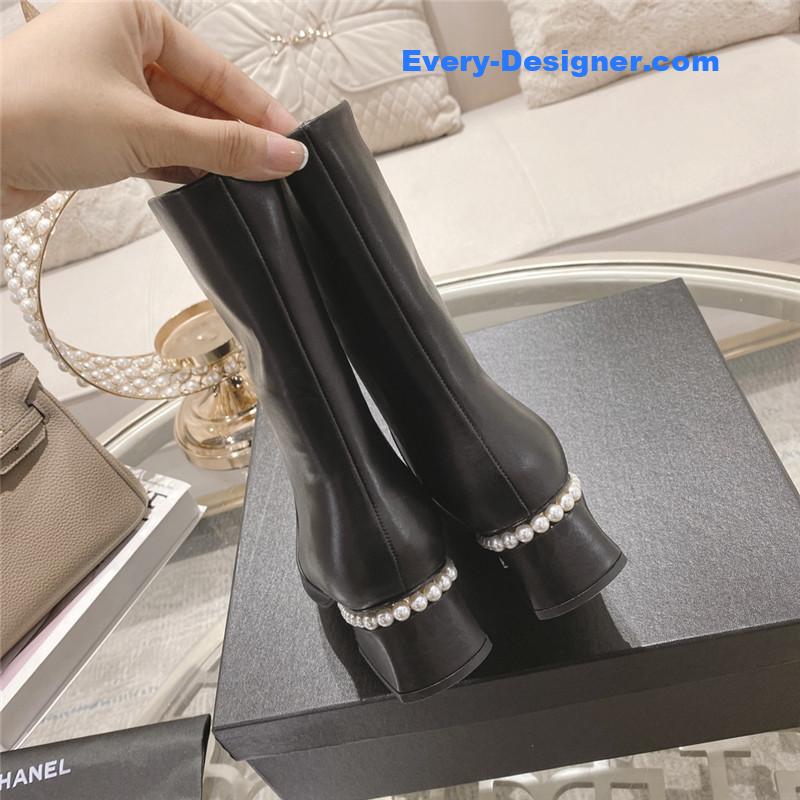 Ch**el black round toe calfskin ankle boots