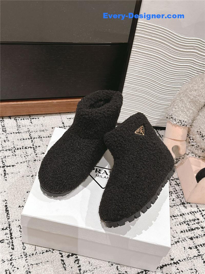 Pra*a black shearling booties