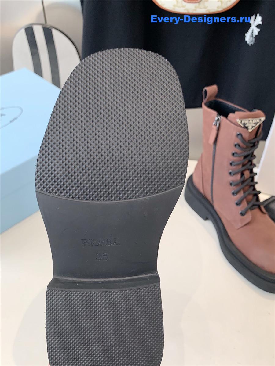 Pra*a calfskin triangle logo brown high top boots