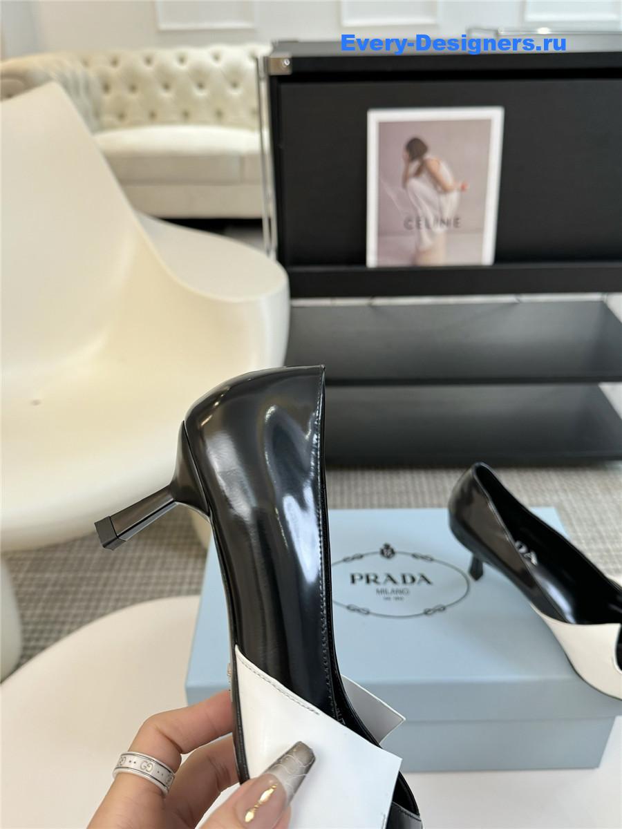 Pra*a smooth leather pumps in white/black