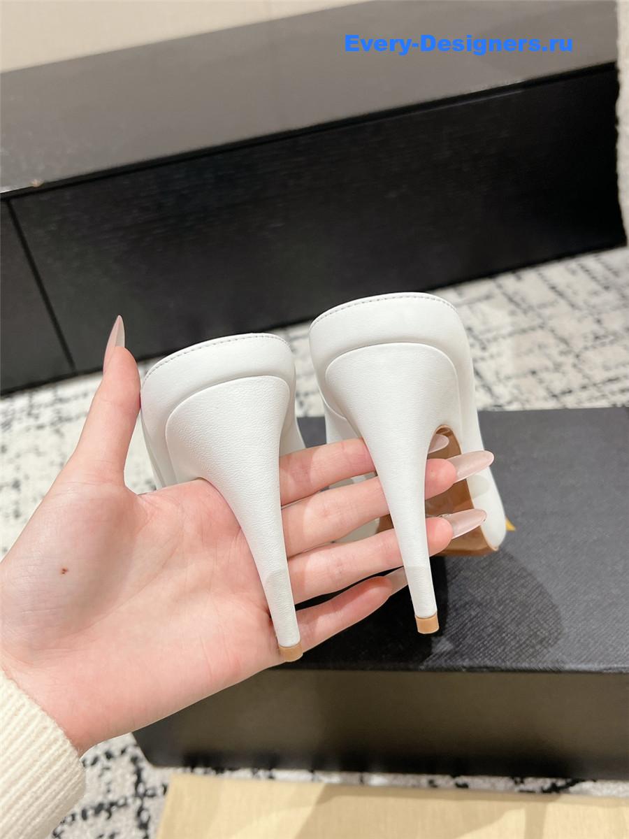 Alaia White Spike Mules in Calfskin