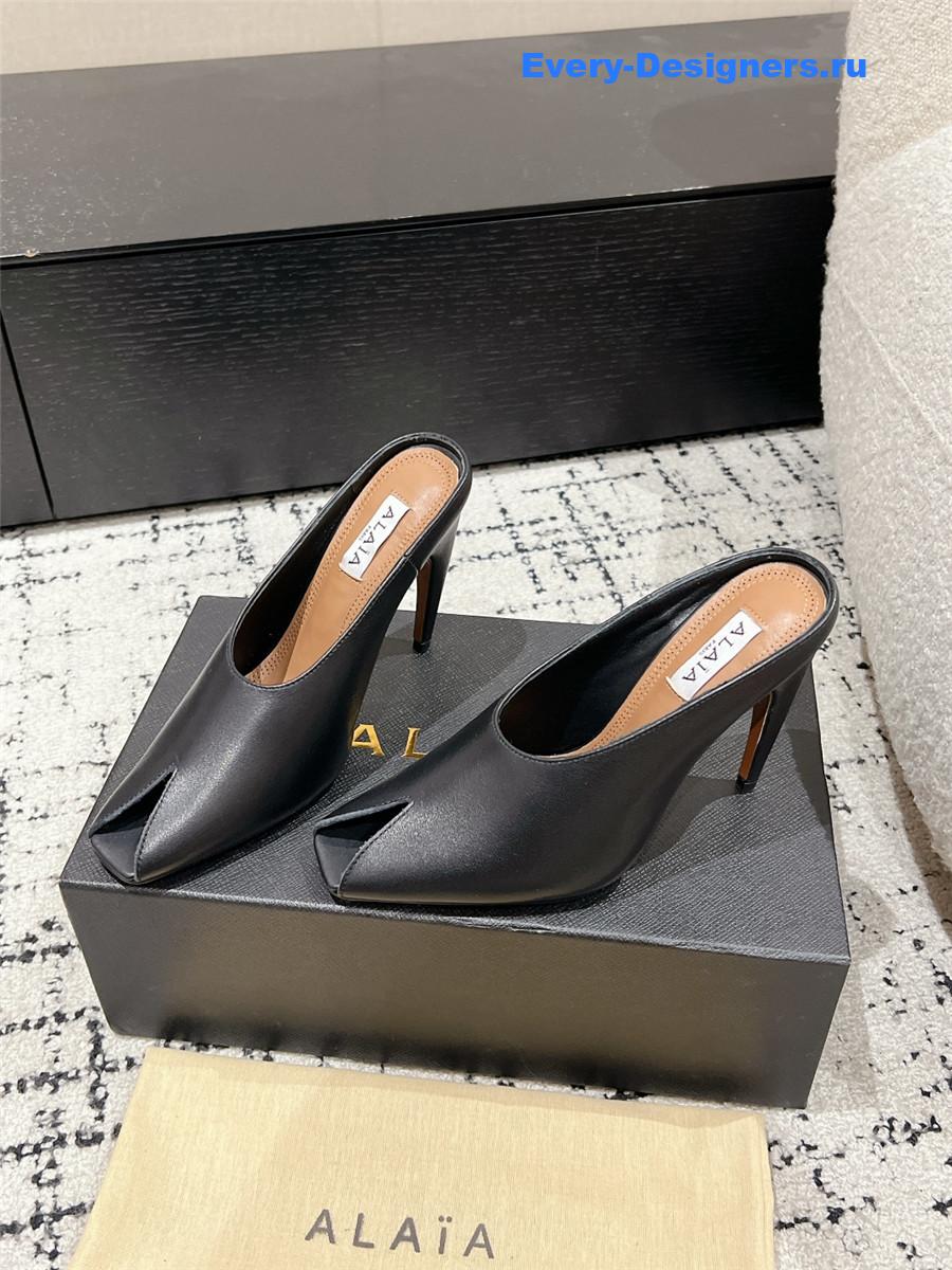 Alaia Black Spike Mules in Calfskin