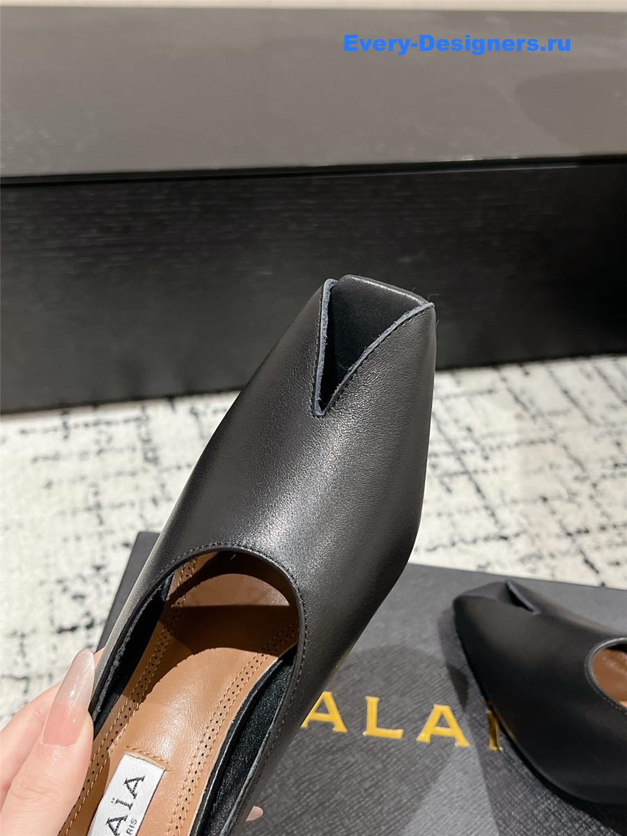 Alaia Black Spike Mules in Calfskin