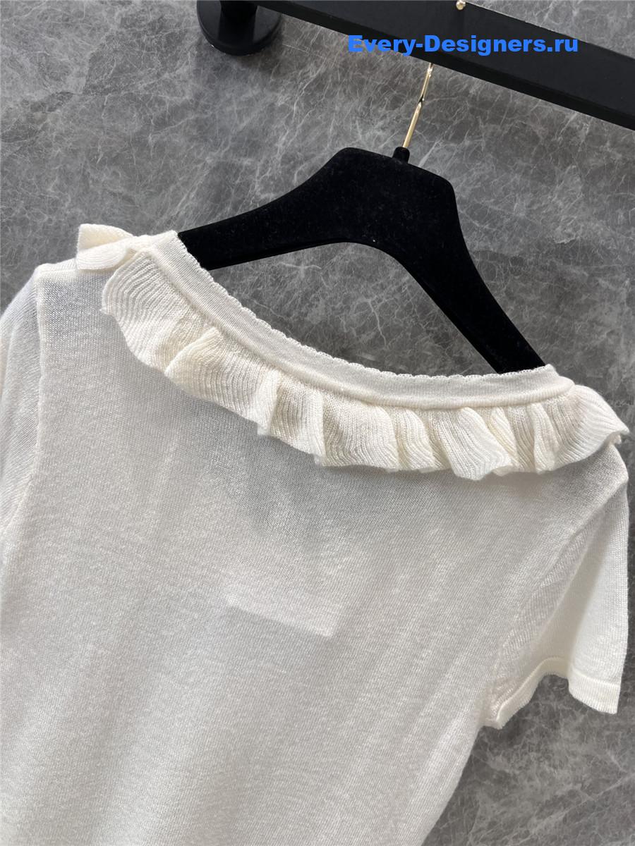 Ch**el beige crew neck knit top