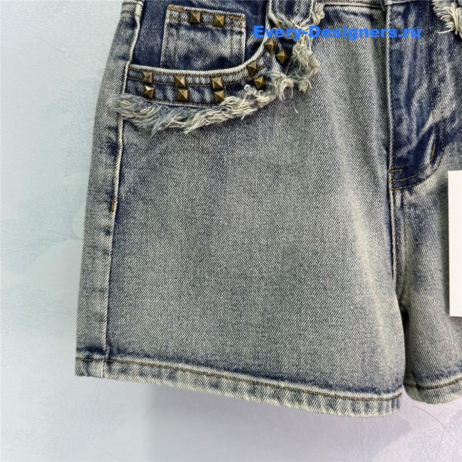 Ch**el rivet pocket edge denim shorts
