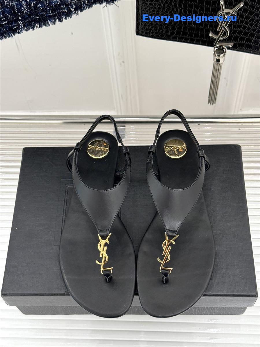 Sa1nt Lau*nt black cassandre flip flops