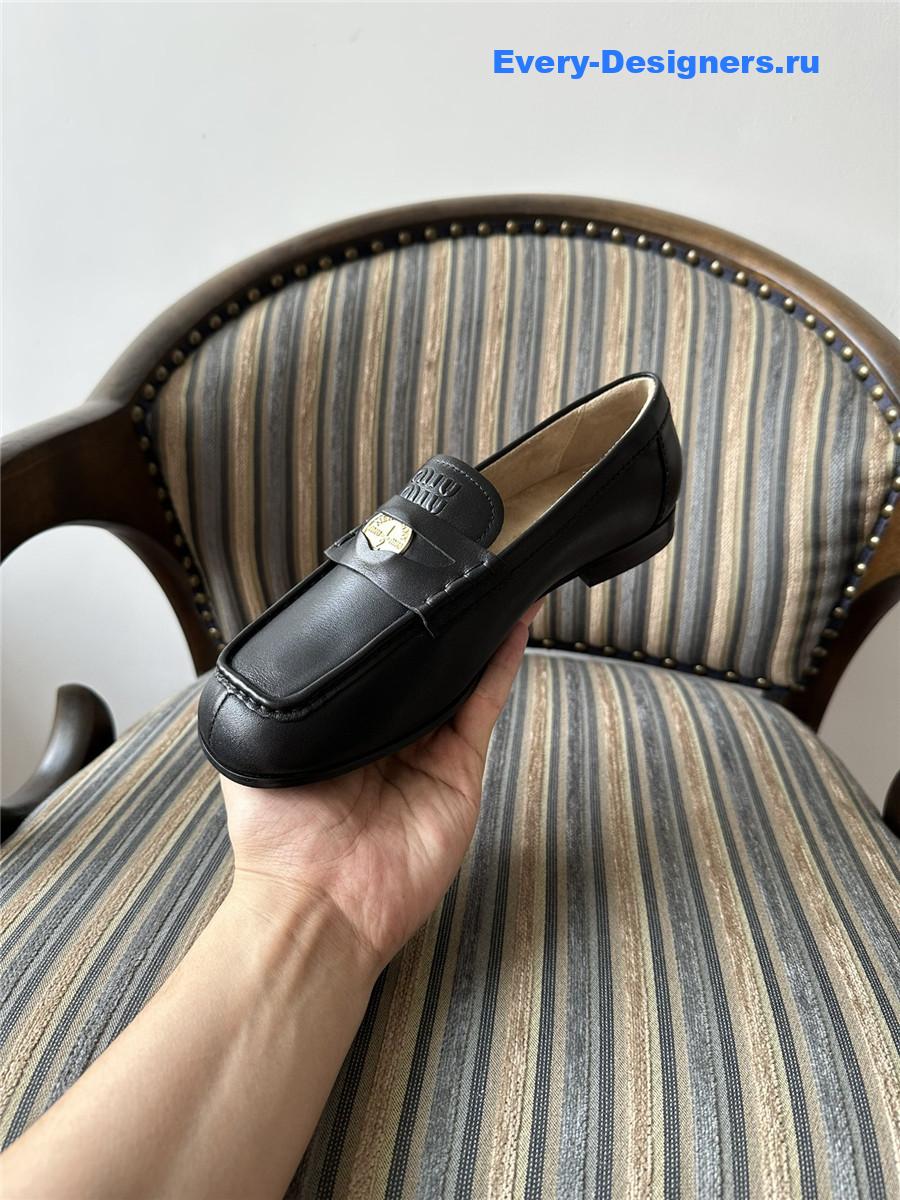 Miu Miu Black Leather Penny Loafers