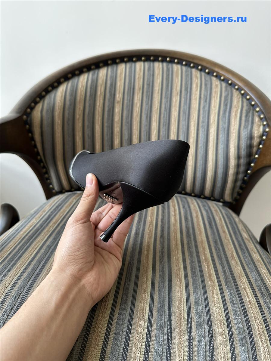 Pra*a black pointed toe pumps