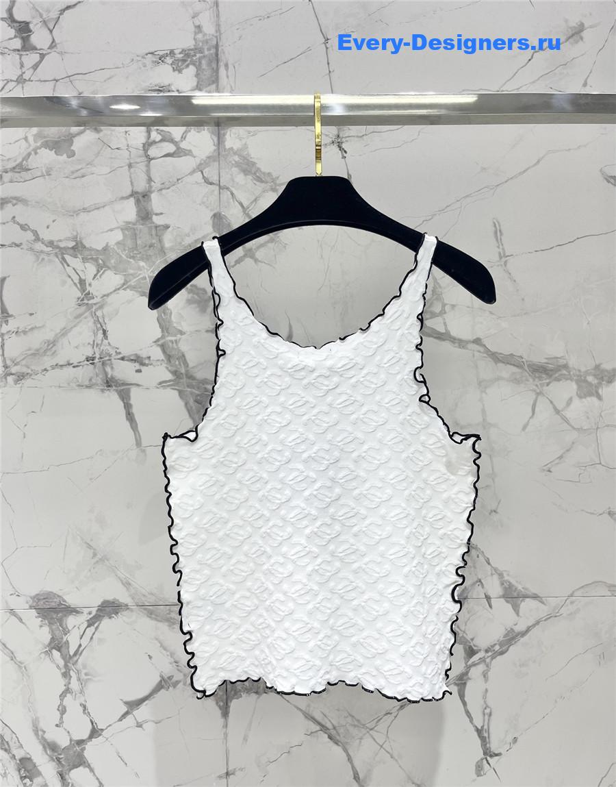 Ch**el embroidered wool-silk top in white