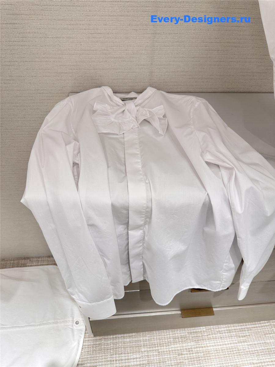 Sa1nt Lau*nt white bow blouse