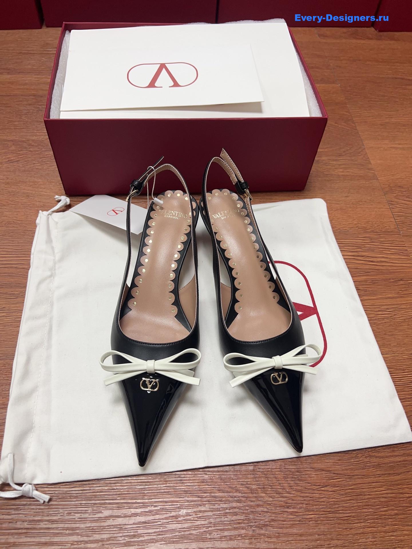 Va1e*ntin0 garavani bow slingback pumps in black