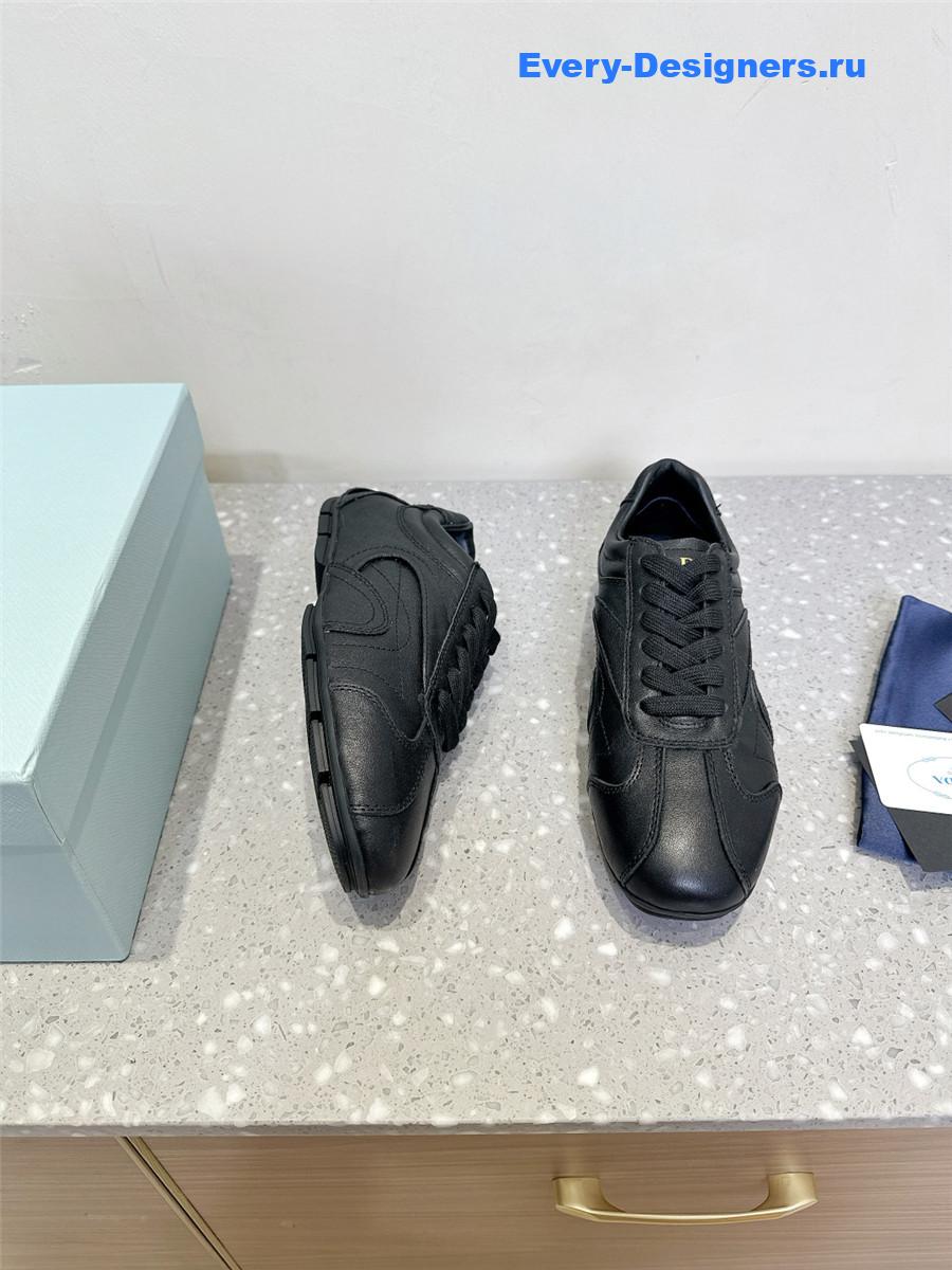 Pra*a black leather low-top sneakers