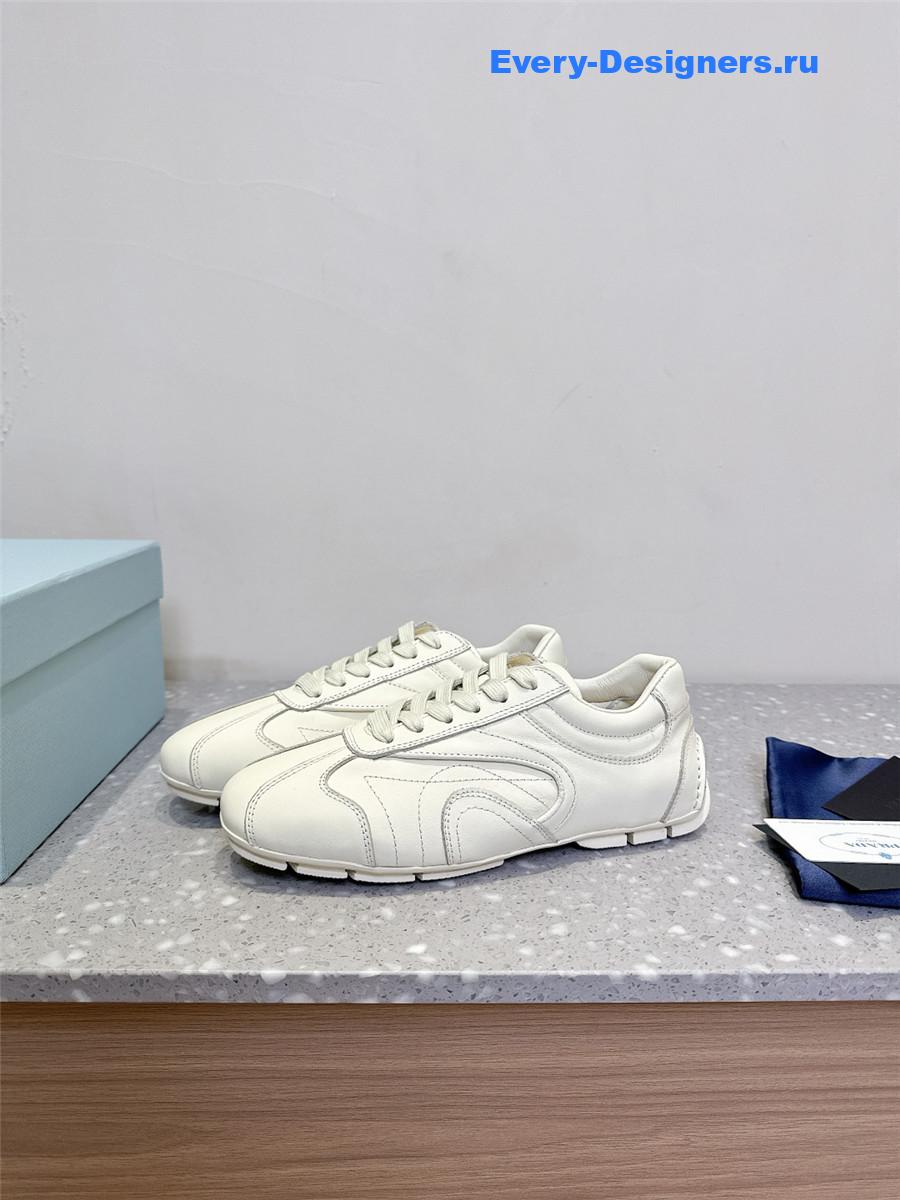 Pra*a white leather low-top sneakers