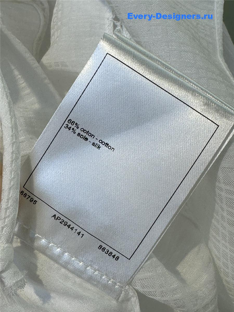 Ch**el white v-neck bow camisole