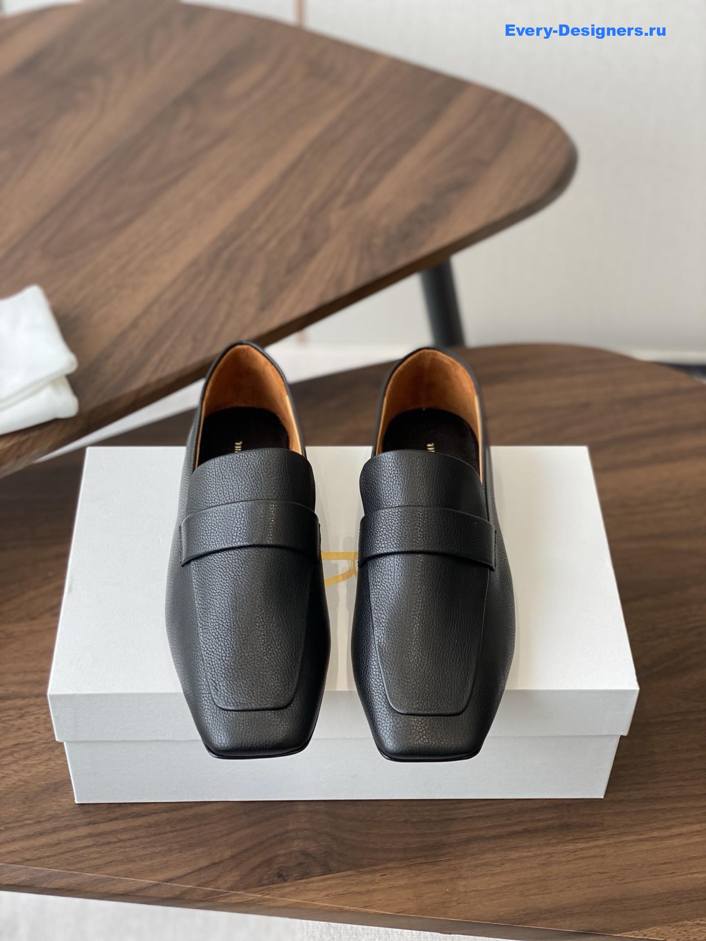 The R0w black square leather loafers