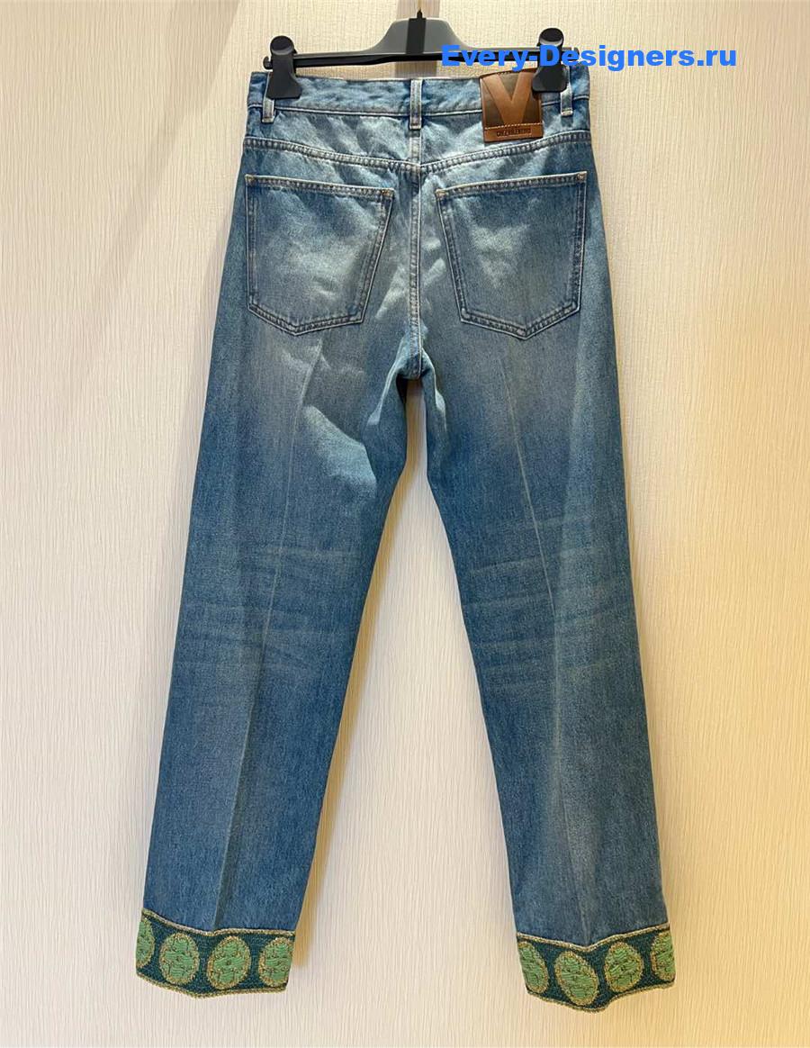 Va1e*ntin0 jacquard-trimmed wide-leg jeans