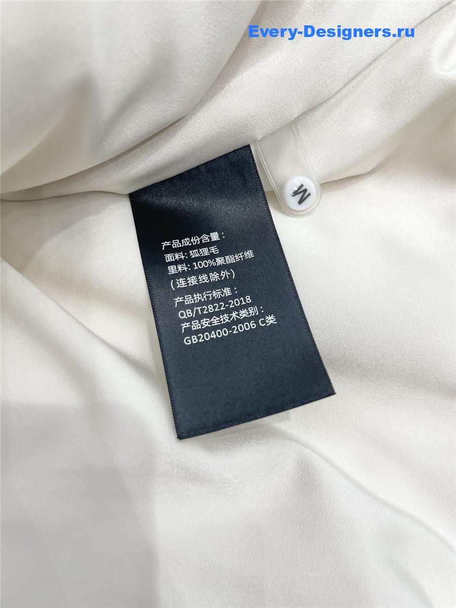 Sa1nt Lau*nt white faux fur coats